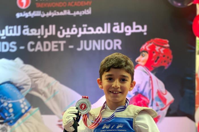 عوني فريج يحصد فضية بطولة المحترفين الرابعة للتايكواندو على مستوى المملكة WhatsApp Image 2024-11-22 at 3.36.16 PM