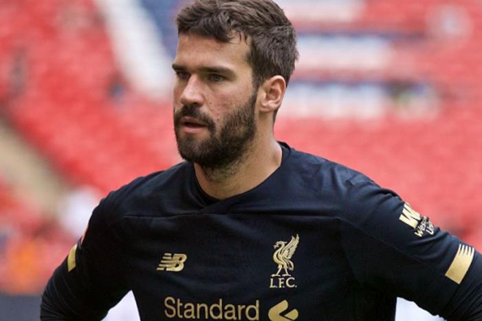 99-151809-klopp-alisson-after_700x400