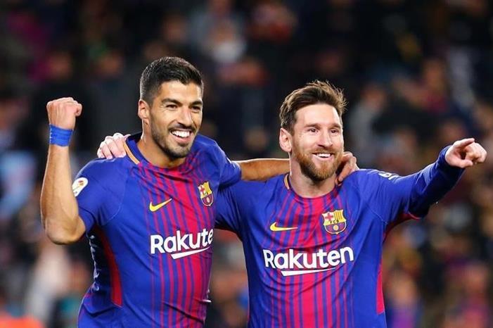 سواريز يستذكر ميسي برسالة غريبة ليونيل-ميسي-ولويس-سواريز