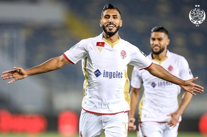 الوداد المغربي ينهي دور المجموعات متصدرا Eyo0e9FWEAcY41b