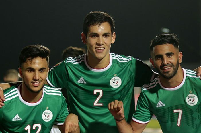 اتهامات لنجم المنتخب الجزائري بالخيانة adam-ounas-aissa-mandi-and-riyad-mahrez-of-algeria-celebrates-a-victory-during-afcon-2019_1h237m3qt77wf15whpx08suwr6