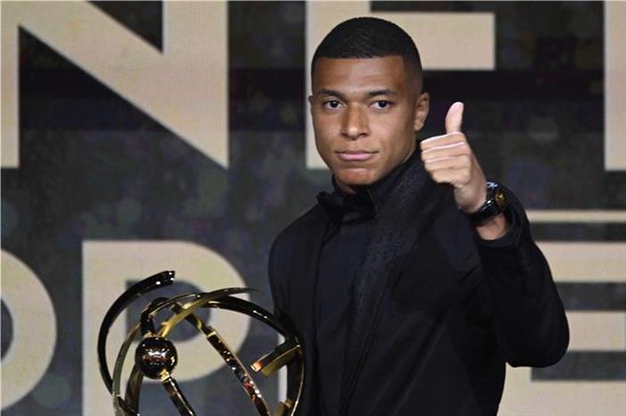 مبابي يرد بابتسامة عريضة على إمكانية انتقاله لريال مدريد afp_20230529_20230529-afp_33gg86a_afp