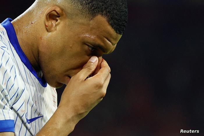 2024-06-17T221356Z_1413723086_UP1EK6H1N0MPD_RTRMADP_3_SOCCER-EURO-AUT-FRA-REPORT