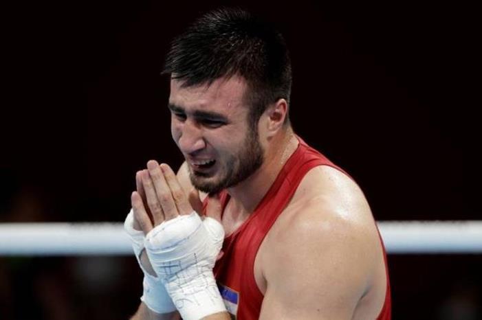 الأوزبكي جالولوف يتوج بذهبية الملاكمة لوزن فوق الثقيل في أولمبياد طوكيو 1265029