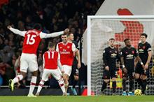 2020-01-01T204904Z_592164411_RC287E9NLXNZ_RTRMADP_3_SOCCER-ENGLAND-ARS-MUN-REPORT