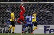 football-soccer-porto-v-borussia-dortmund-europa-league-dragao-stadium-porto-portugal-250216-borussia-dortmunds-goalkeeper-roman-burki-saves-the-ball-against-porto-reutersrafael-marchante-2E6HPHX