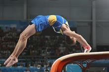 1280px-2018-10-14_Gymnastics_at_2018_Summer_Youth_Olympics_–_Boys'_Artistic_Gymnastics_–_Apparatus_finals_–_Vault_(Martin_Rulsch)_176