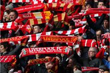 fans_of_liverpool_show_their_support_during_the_premier_league_m_1516758-768x512